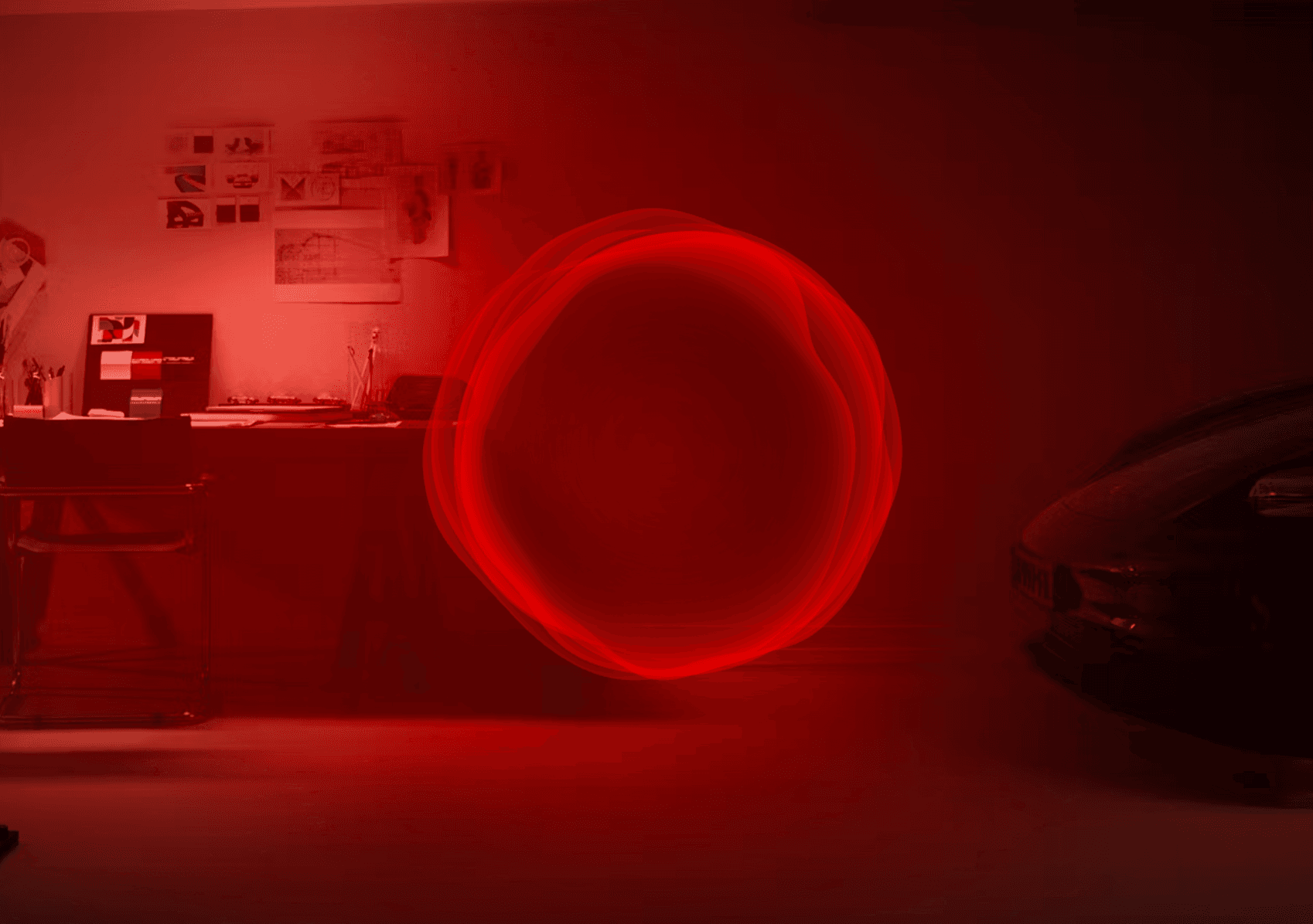 A floating AI orb in the middle of a dimly lit garage